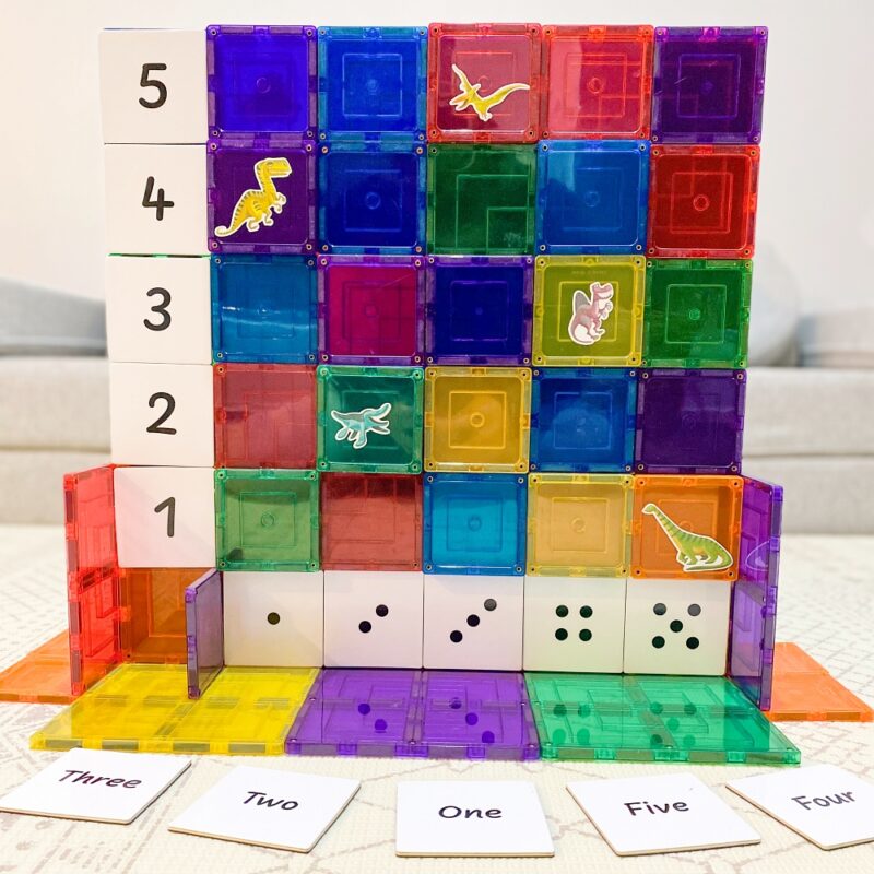 Numeracy tile toppers used on a large rainbow square made of magnetic tiles from learn & grow toys