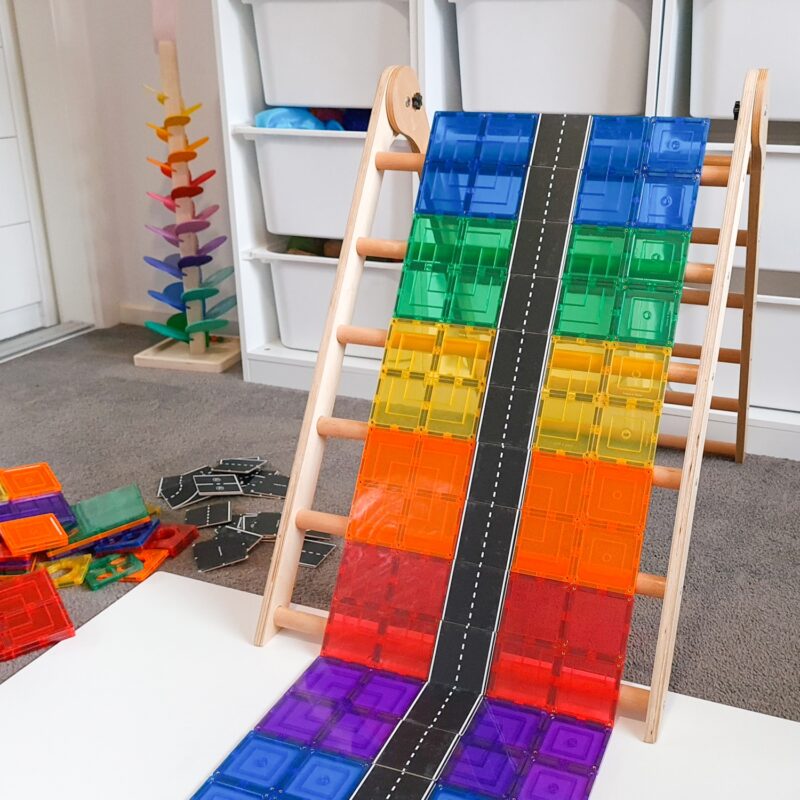 Road toppers on massive rainbow tile road over wooden frame